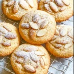 Delicious homemade almond croissant cookies on a baking tray