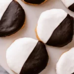 Delicious homemade black and white cookies on a plate