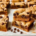 Freshly baked Chocolate Chip Blondies with chocolate chips on top