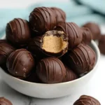 Chocolate Peanut Butter Balls Recipe 5 Delicious Chocolate Peanut Butter Balls made with creamy peanut butter and rich chocolate.