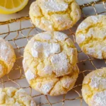 Lemon Crinkle Cookies Recipe 7 Plate of freshly baked Lemon Crinkle Cookies dusted with powdered sugar