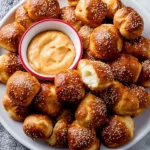 Homemade soft pretzel bites fresh out of the oven, golden and fluffy.